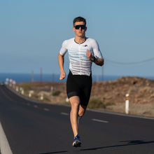 Load image into Gallery viewer, Men’s aerodynamic triathlon suit – high-performance, colorful design for speed and comfort