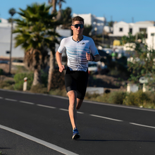 Load image into Gallery viewer, Men’s tri suit with aerodynamic compression fabric for maximum performance
