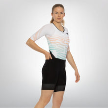 Load image into Gallery viewer, Women’s aerodynamic triathlon suit with sleeves – high-performance, stylish design
